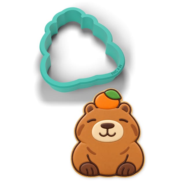 Capybara with an Orange cookie cutter